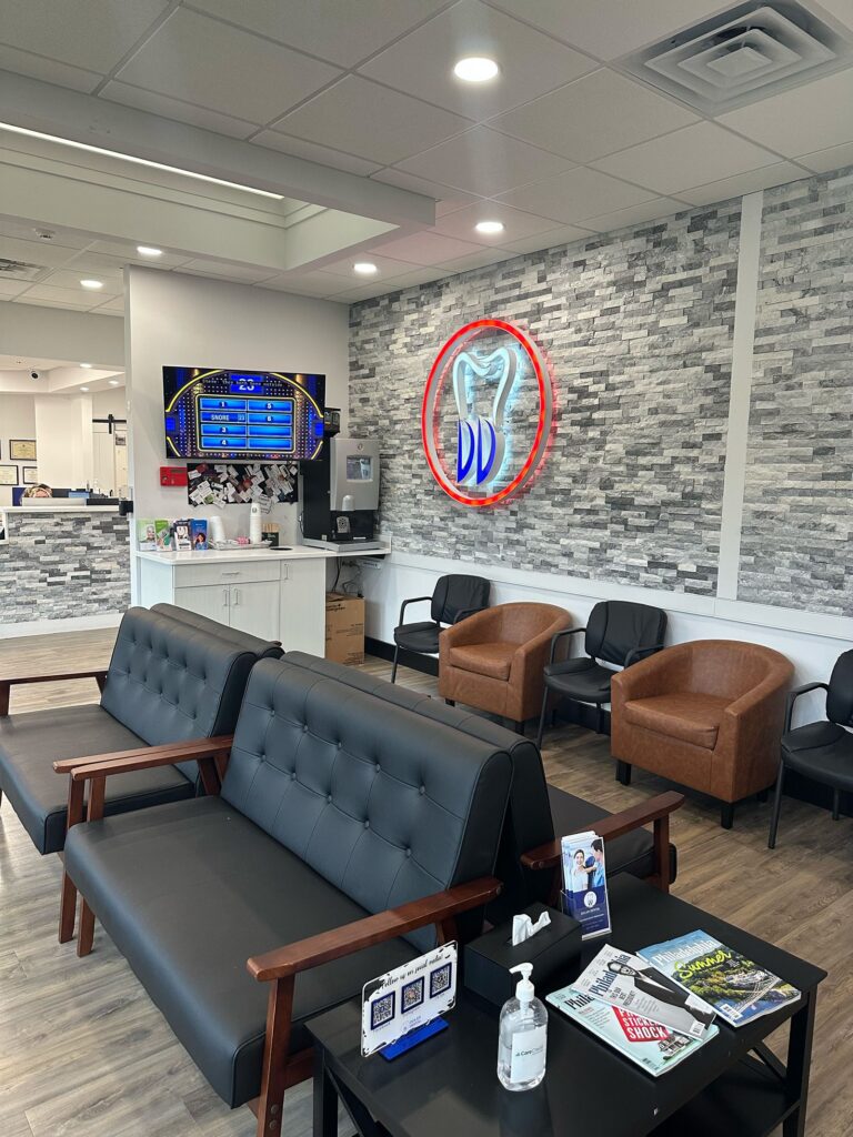 Dolan Dental waiting area with the DD logo